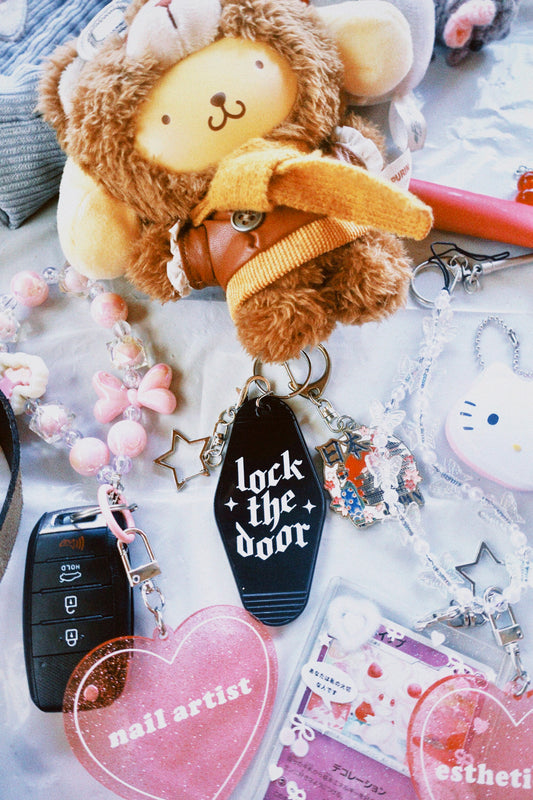 Lock the Door Motel Keychain