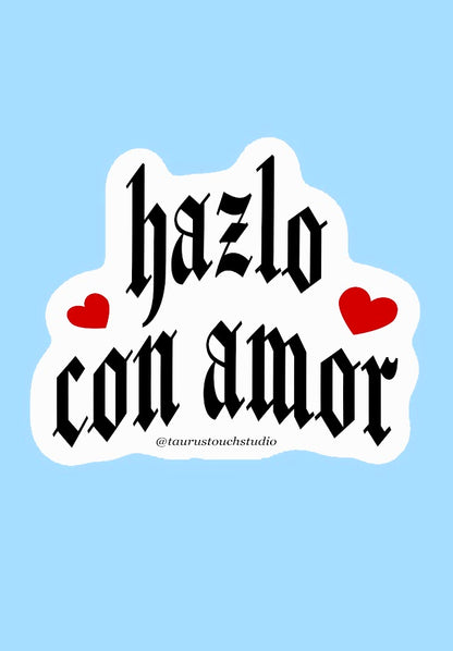Sticker with 'hazlo con amor' text on a light blue background