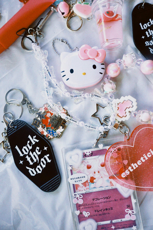 Lock the Door Motel Keychain
